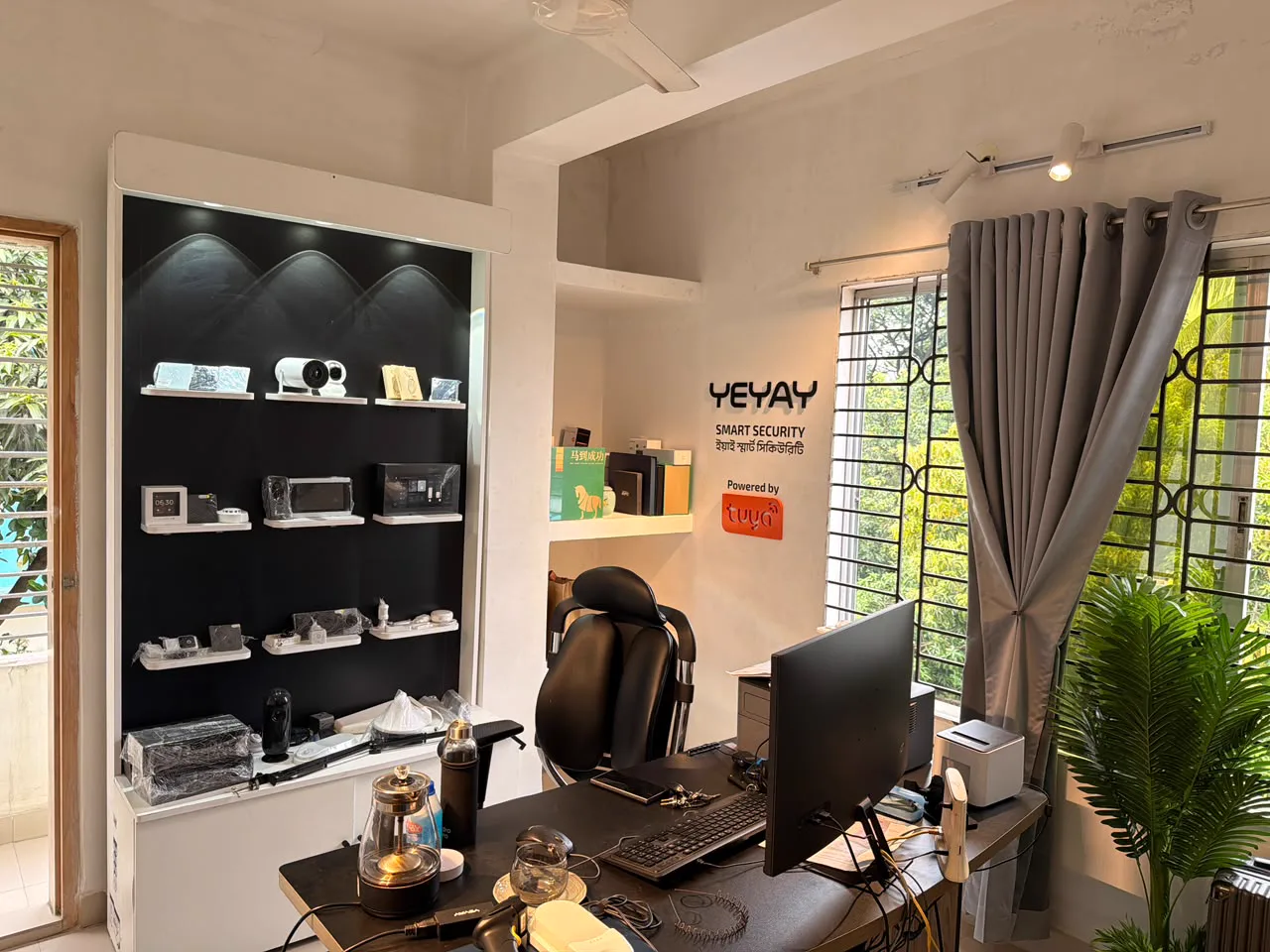 Smart home device display shelves and YEYAY Powered by Tuya sign