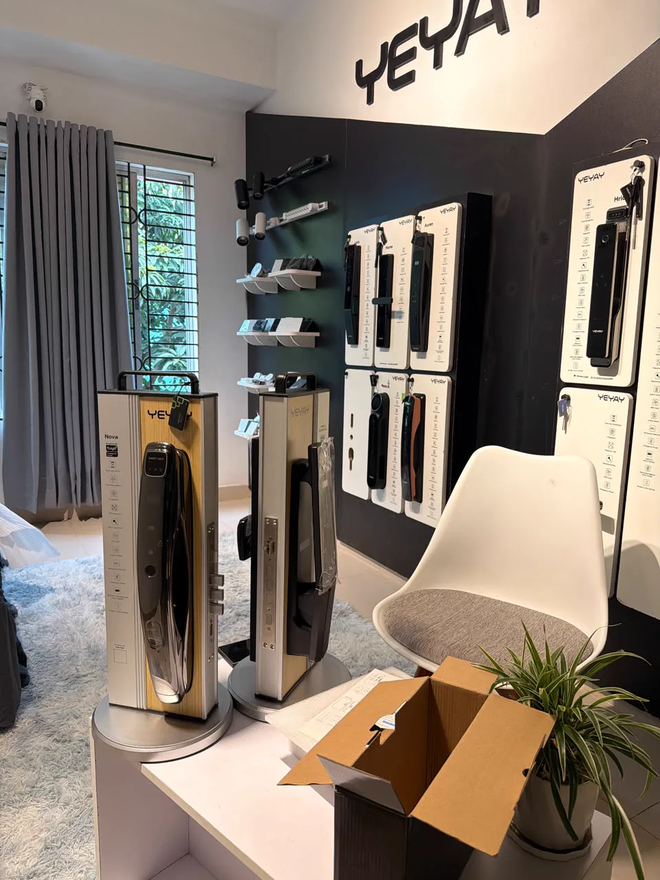Nova smart lock stands in front of the YEYAY lock display boards